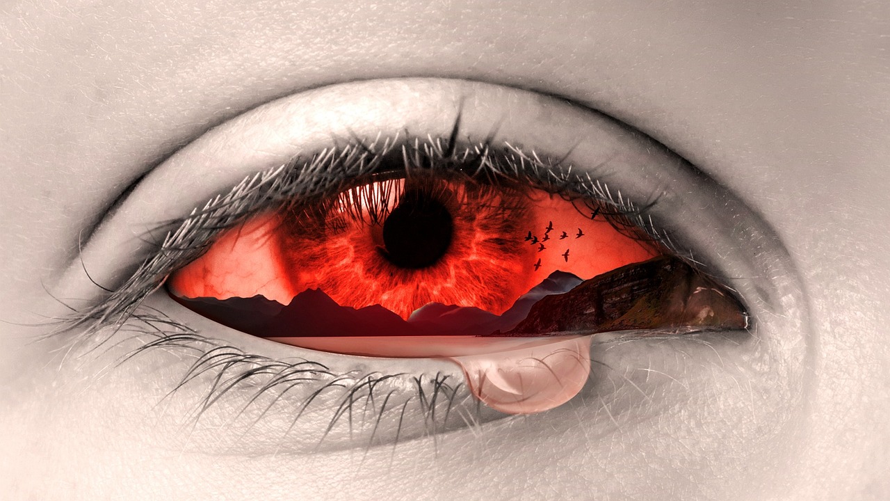 a close up of a person's eye with a mountain in the background, inspired by Igor Morski, surrealism, crying blood, avatar image, about to consume you, red tint