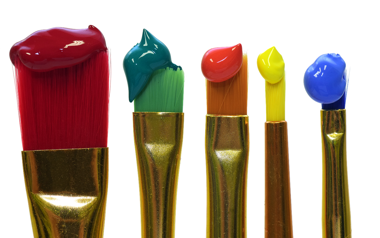 a group of paint brushes sitting next to each other, an airbrush painting, inspired by Morris Louis Bernstein, flickr, fantasy colours, colored neons, glossy paint, gold black and rainbow colors