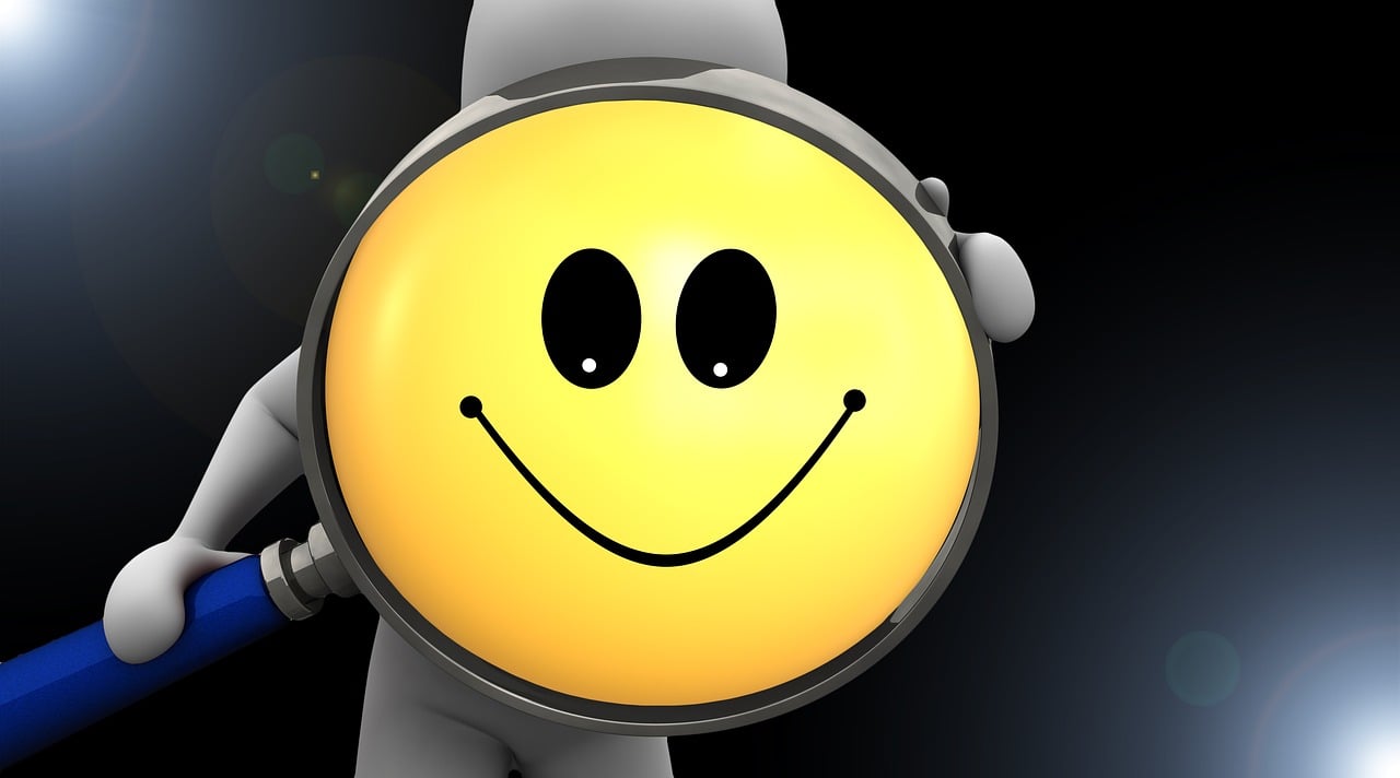 a person holding a magnifying glass with a smiley face on it, a cartoon, inspired by Jim Davis, pixabay, glowing oled visor, rendered in cinema 4 d, oval shape face, istock