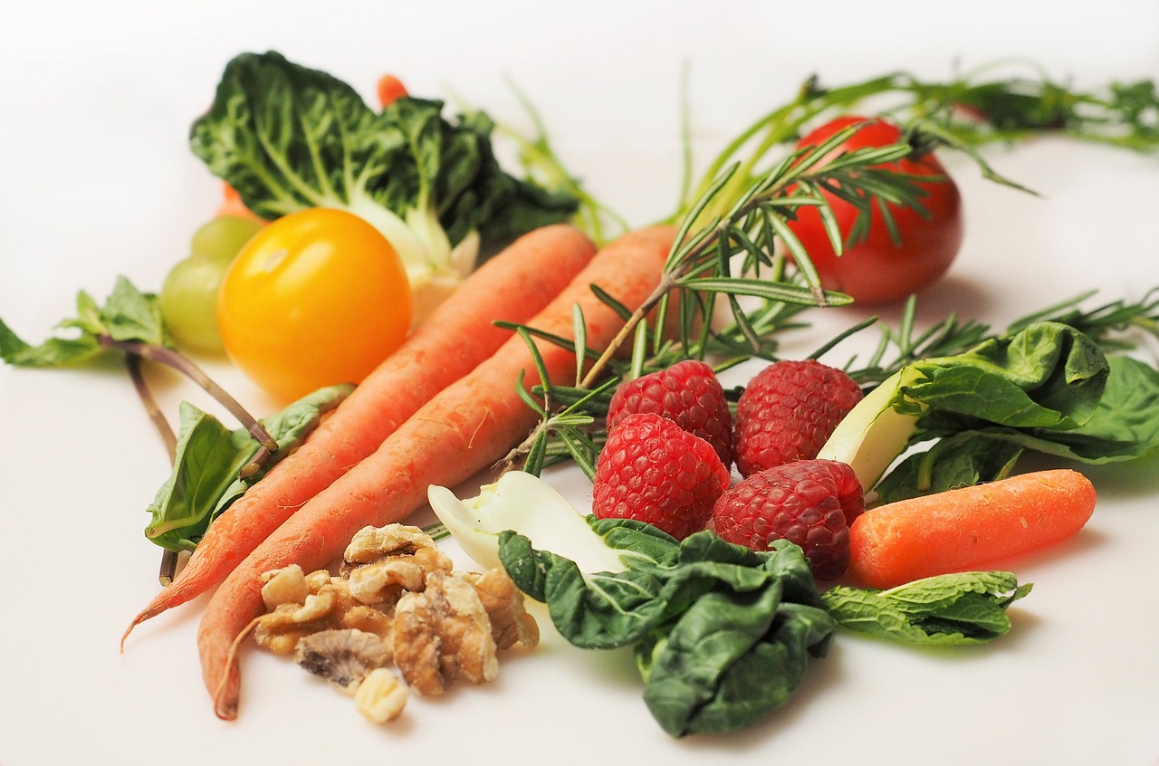 a white plate topped with carrots, raspberries, and other vegetables, a picture, pexels, realism, greens), 3 4 5 3 1, mineral grains, sunny light