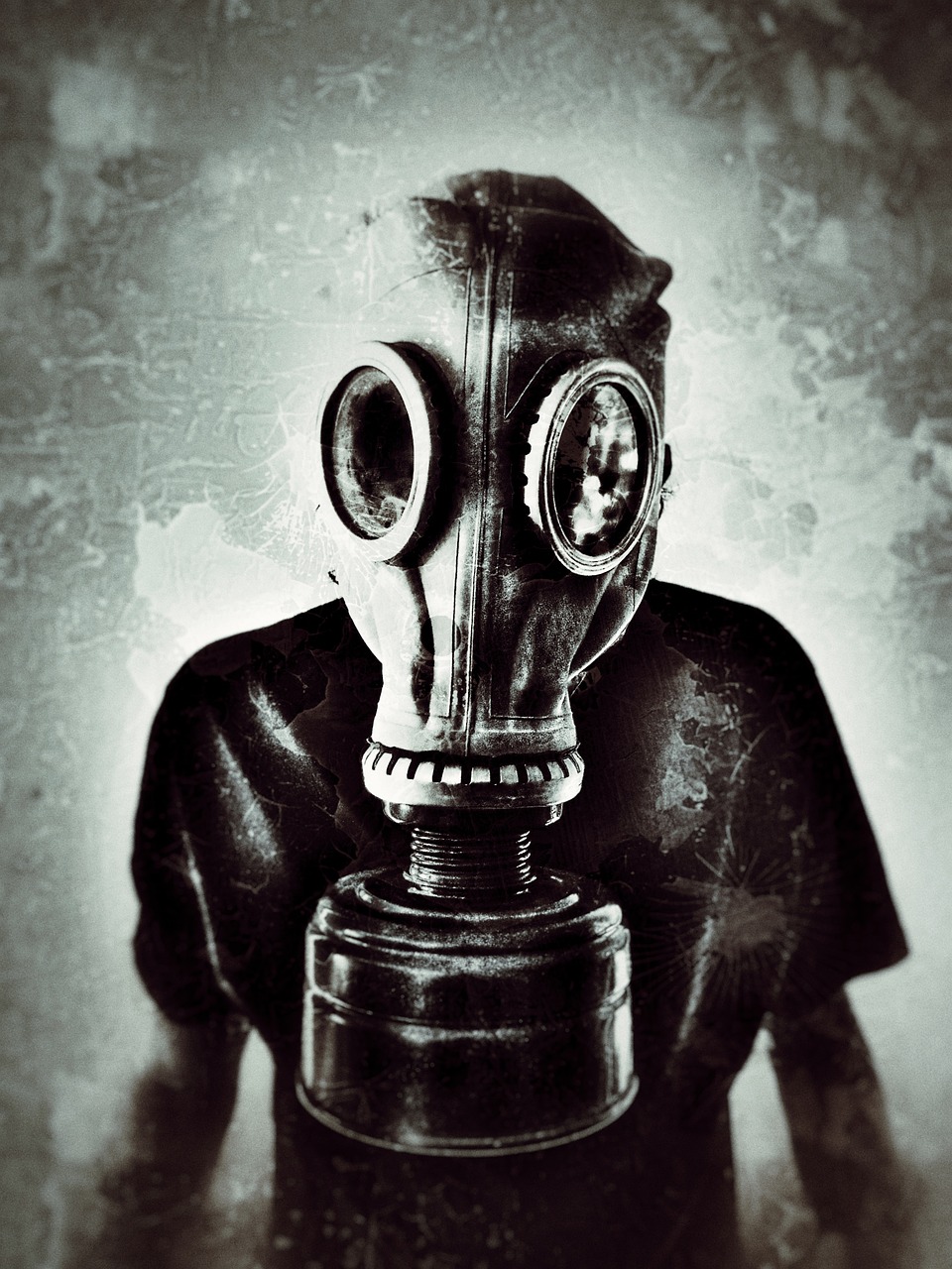 a black and white photo of a man wearing a gas mask, an album cover, by Stefan Gierowski, shutterstock, nuclear art, sepia photography, aaaaaaaaaaaaaaaaaaaaaa, moloch, family photo