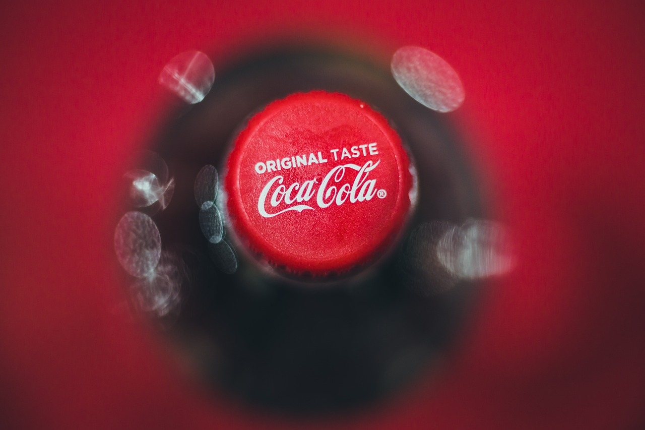 a close up of a bottle of coca cola, a stock photo, photo taken with sony a7r, masterpiece work of art, shot from 5 0 feet distance, high quality product photo