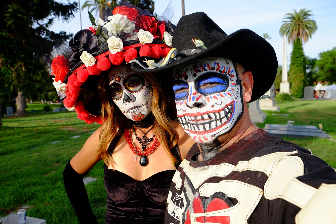 a man and a woman in day of the dead costumes, by Bernie D’Andrea, flickr, california, afp, 🎨🖌️, beautiful sunny day