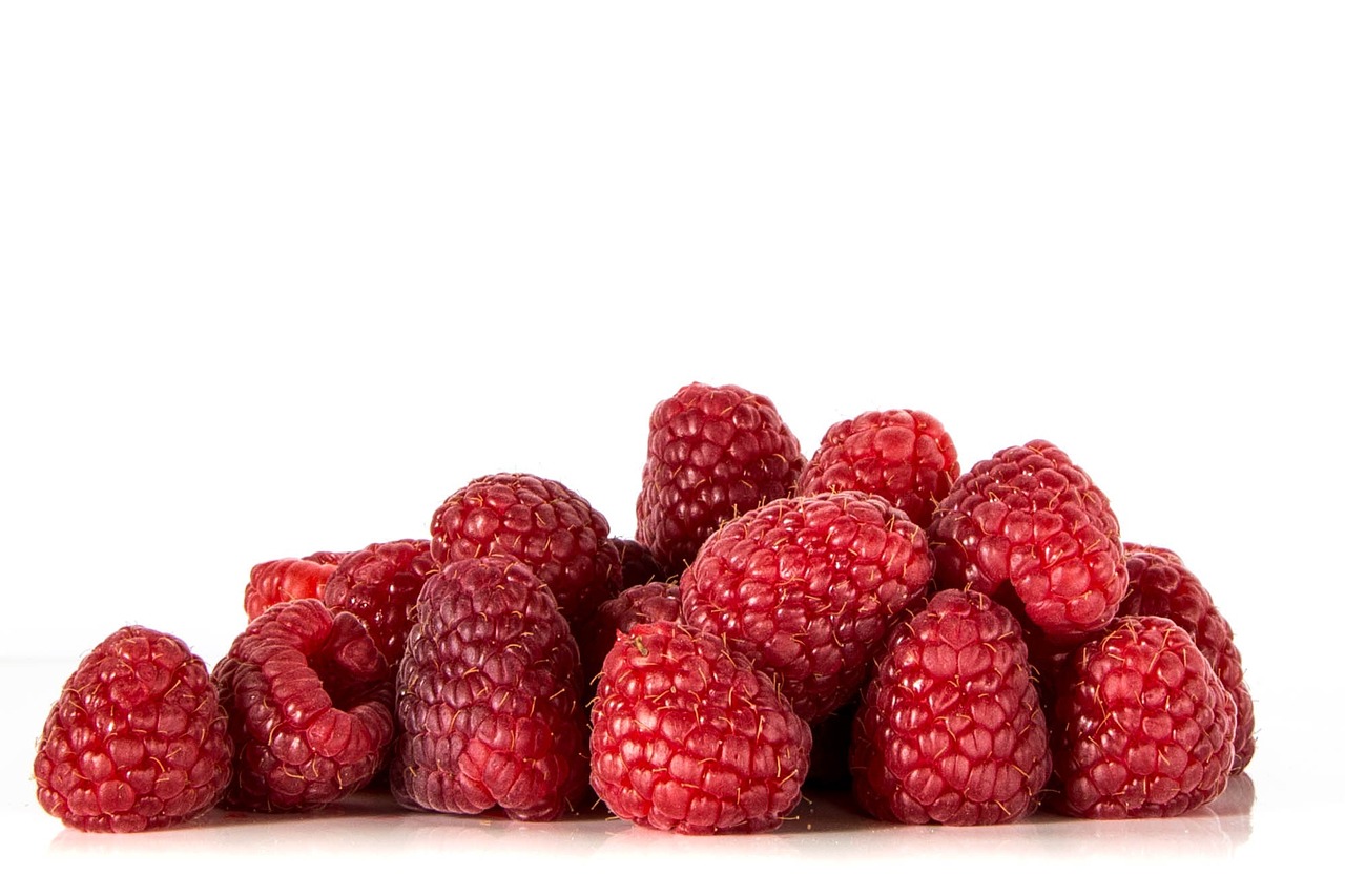 a pile of raspberries on a white surface, renaissance, viewed from the side, 3 4 5 3 1, ocean spray, header