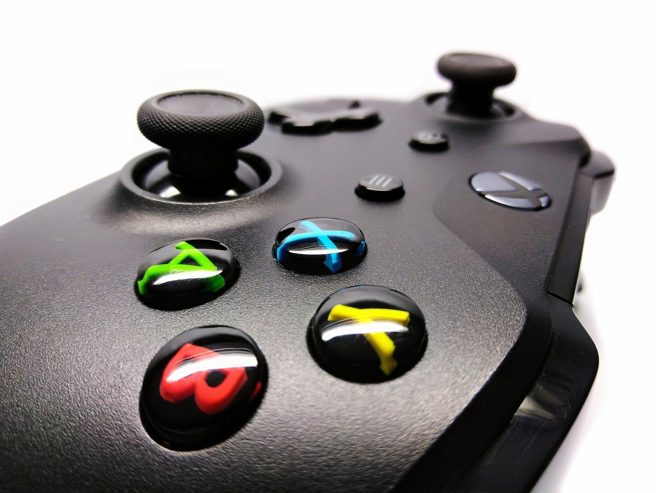 a close up of a video game controller, by Joe Bowler, x - box, rtx reflections, inafune design, oversaturated