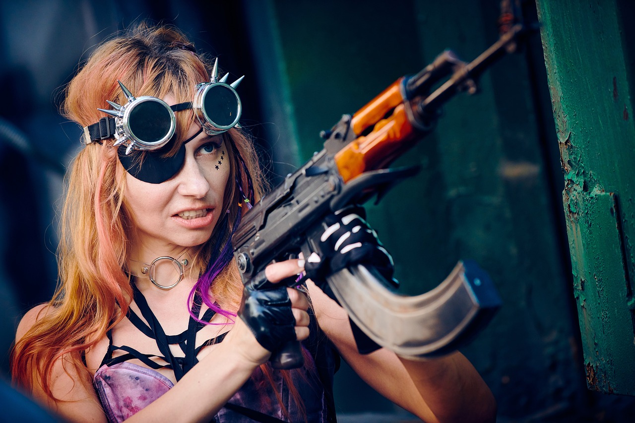 a woman holding a gun and wearing goggles, by Maksimilijan Vanka, tumblr, cosplay, photo taken in 2 0 2 0, nadezhda tikhomirova, deviantar