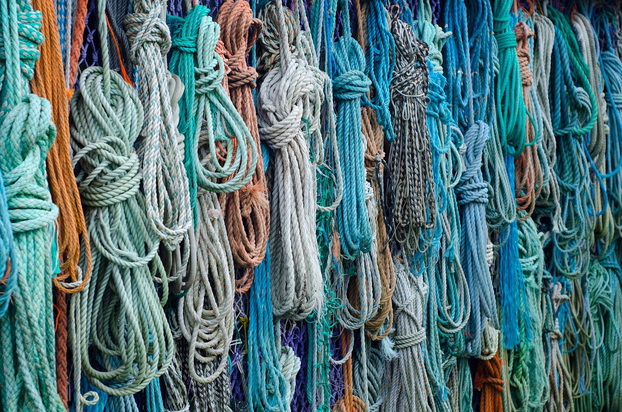 a wall filled with lots of different colored ropes, by Richard Carline, shutterstock, cold blue colors, fisherman, colorado, cornwall