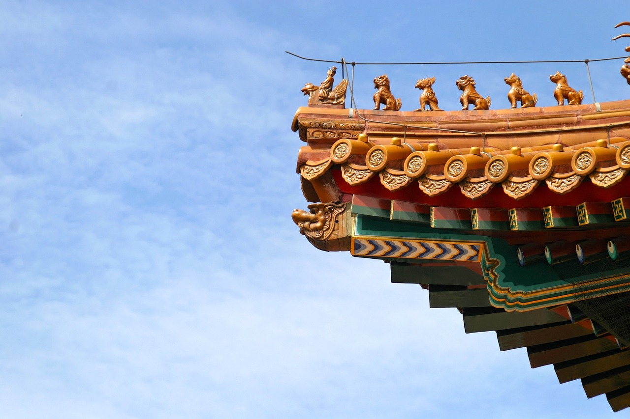 a clock that is on the side of a building, inspired by An Zhengwen, pexels, cloisonnism, intricate detailed roof, on a bright day, banner, golden curve structure