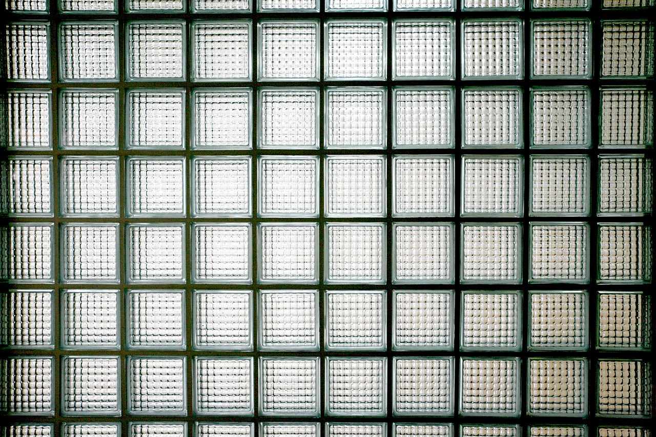 a person sitting on a bench in front of a window, a stock photo, inspired by Andreas Gursky, light and space, checkerboard pattern underwater, aaaaaaaaaaaaaaaaaaaaaa, transparent corrugated glass, detail texture