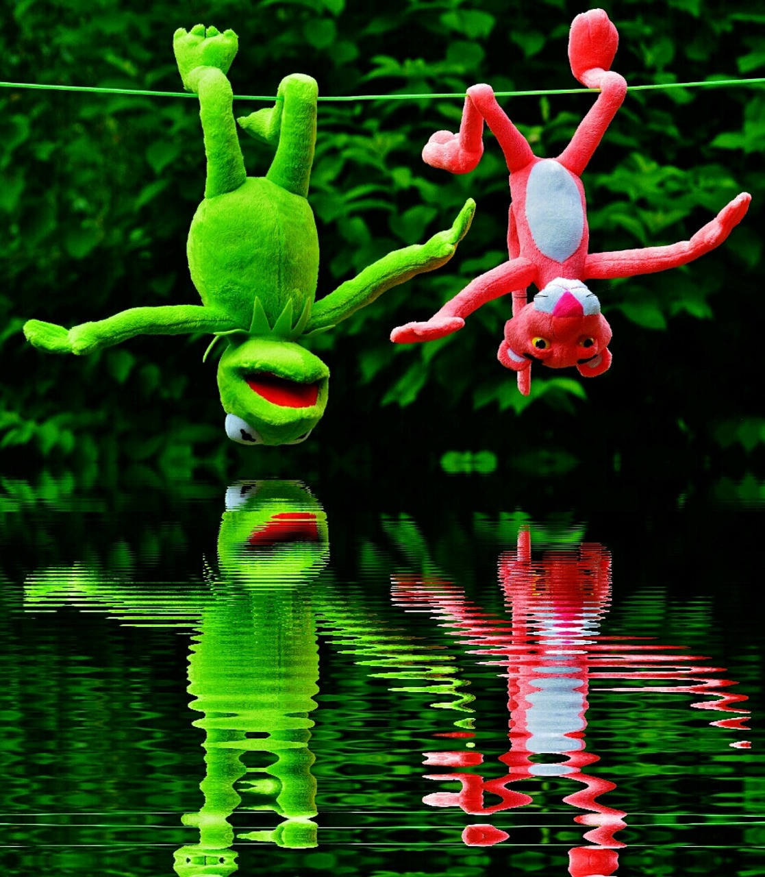a frog hanging upside down over a body of water, by Jan Rustem, flickr, process art, clowns, river with low flying parrots, green bright red, voodoo!!