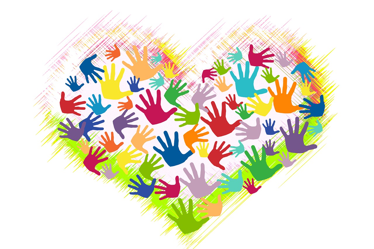 a heart made of colorful handprints on a white background, many hands, 🎨🖌️, corners, ad image