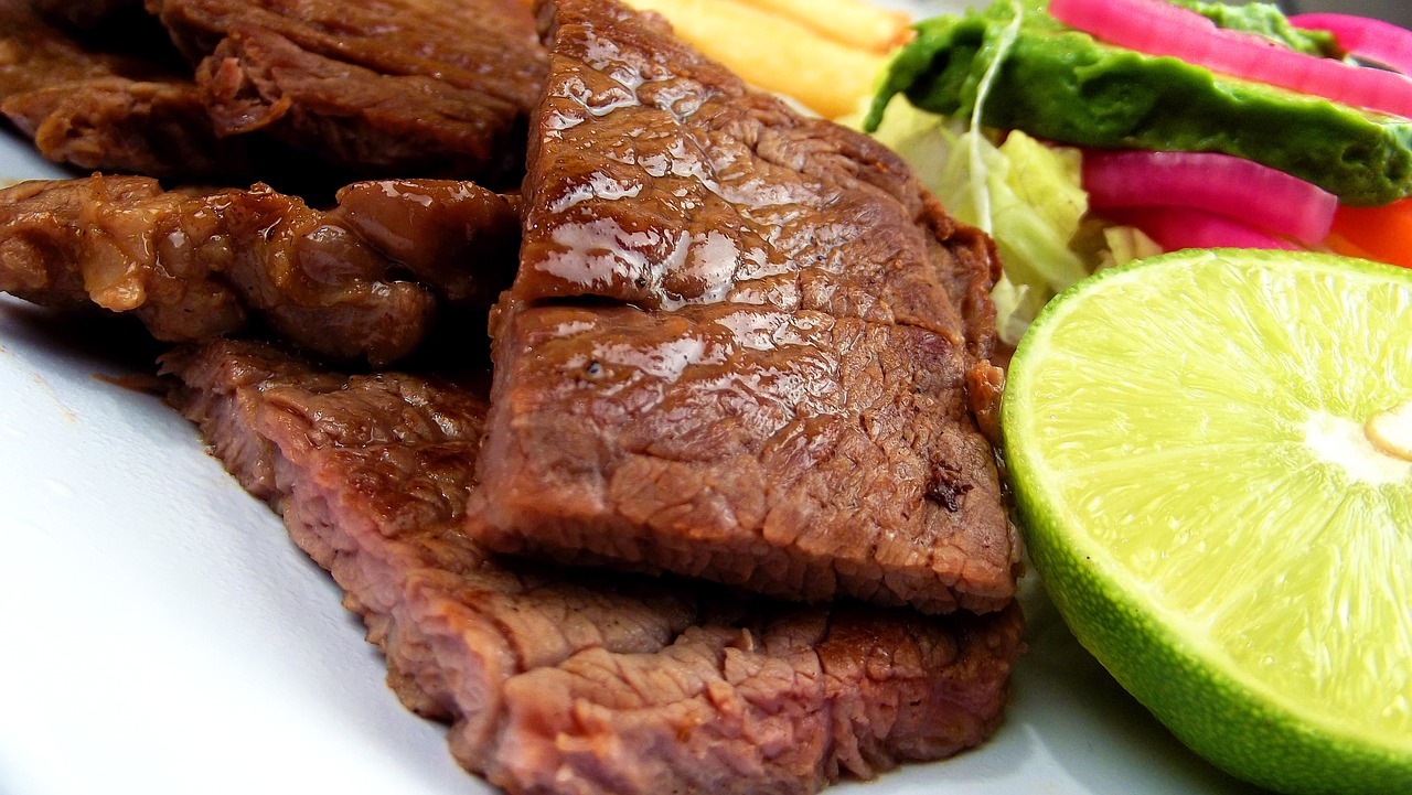 a close up of a plate of food with meat and vegetables, by Carlos Enríquez Gómez, tumblr, chuck roast norris, calf, citrinitas, profile image