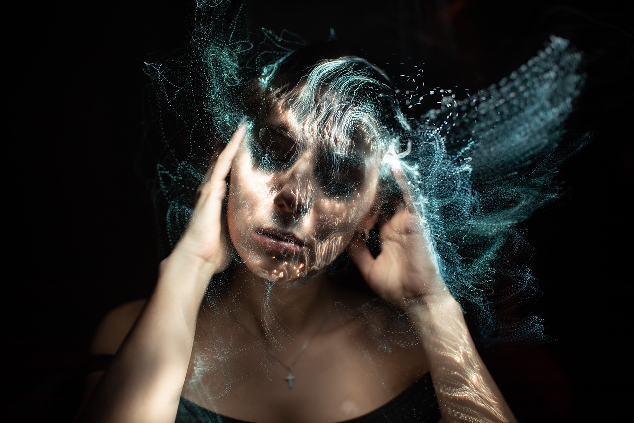 a woman holding her head in front of her face, by Adam Marczyński, holography, inside head cobwebs, liquid magic, istock, stable diffusion self portrait
