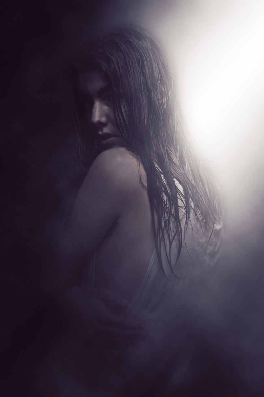 a woman that is standing in the dark, inspired by Bastien L. Deharme, art photography, alexandra daddario, by emmanuel lubezki, ethereal back light, wet skin and windblown hair