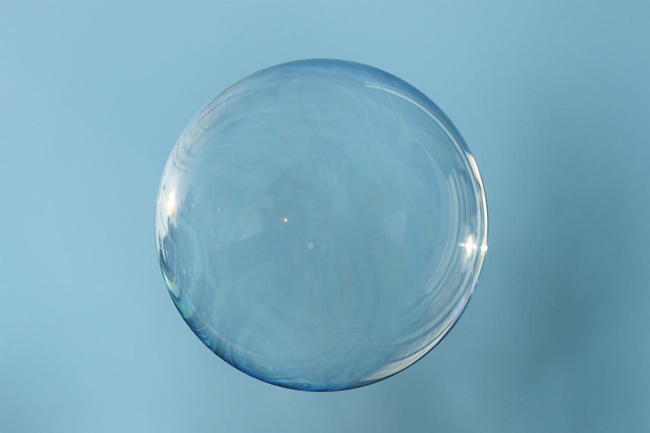 a close up of a soap bubble floating in the air, a picture, flickr, with a blue background, birdseye view, prototype, cad