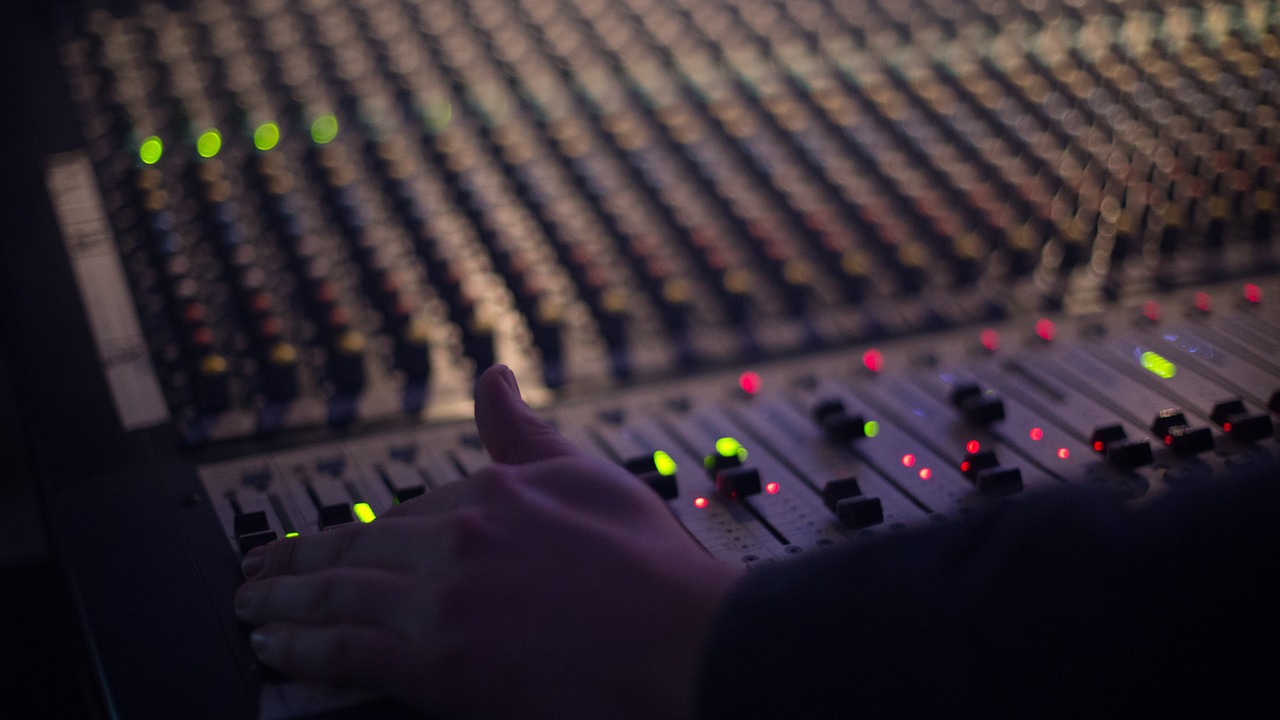 a close up of a person pointing at a sound board, a picture, (night), commercial, working, full colour