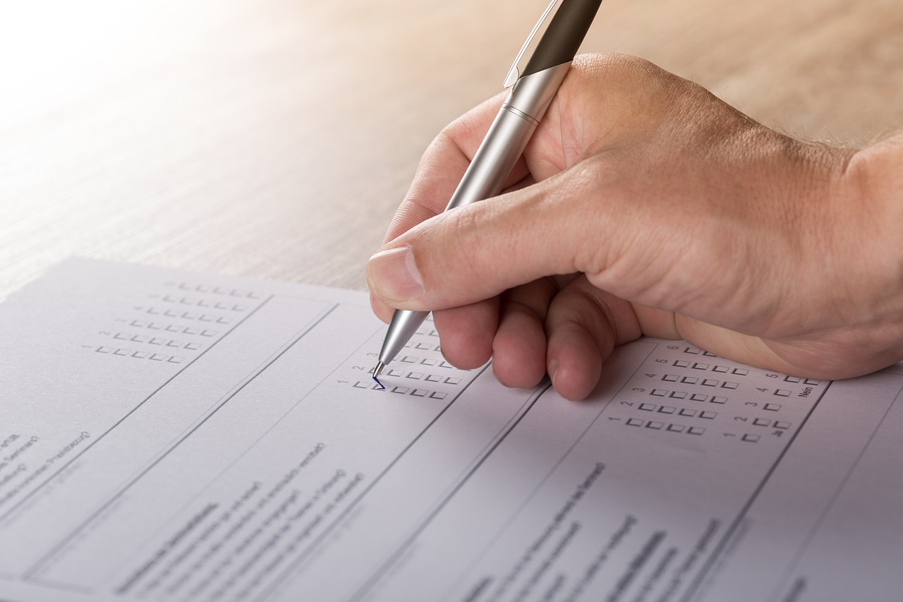 a person writing on a piece of paper with a pen, shutterstock, institutional critique, highly detailed rounded forms, test, forms, marketing photo