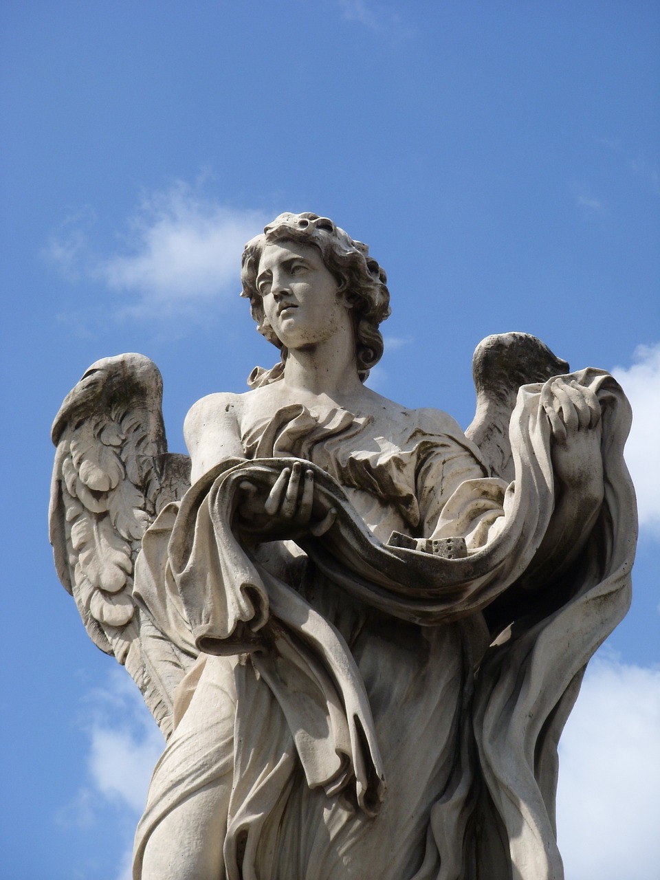 a statue of an angel on top of a building, a statue, inspired by Gian Lorenzo Bernini, neoclassicism, young handsome pale roma, with large wings, proper shading, very ornate