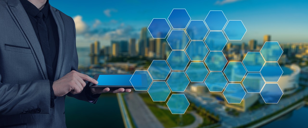 a man in a suit holding a smart phone, digital art, shutterstock, hexagons in the sky, tech city in the background, sustainable architecture, cryptocurrency in the background