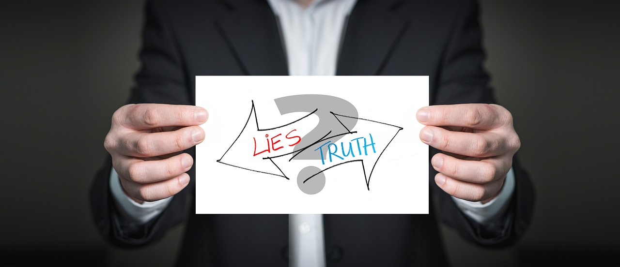 a man in a suit holding a piece of paper with a question mark on it, by John Murdoch, pixabay, unilalianism, hidden truth, lying down, lie detector test, lying on an abstract