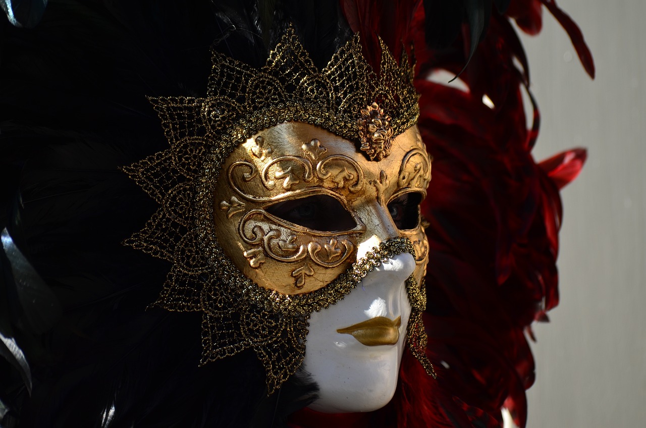 a close up of a mask on a mannequin head, a picture, baroque, red black white golden colors, intricate highly detailed 8 k, feathers, side view close up of a gaunt