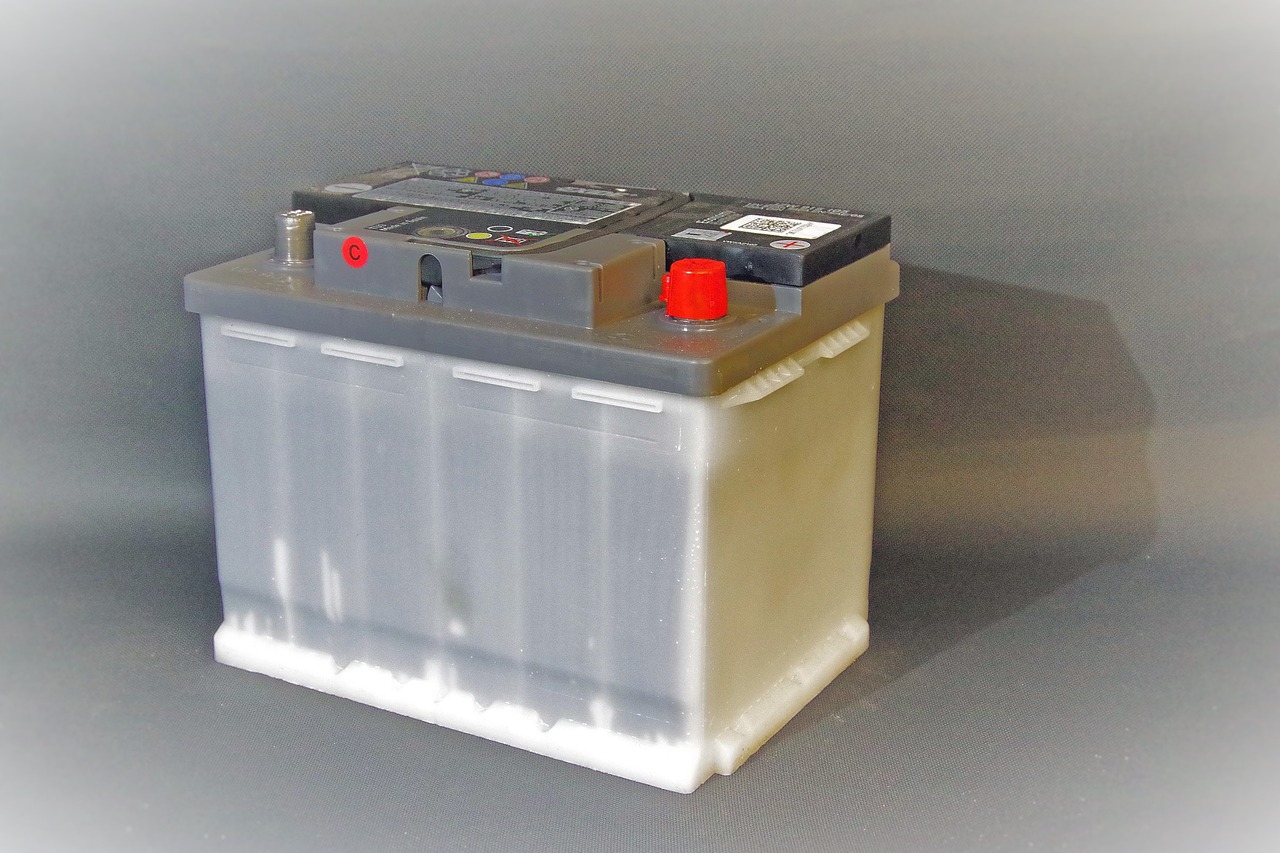 a car battery sitting on top of a table, by Jason Felix, semi-transparent, white plastic, damp, fluid electricity