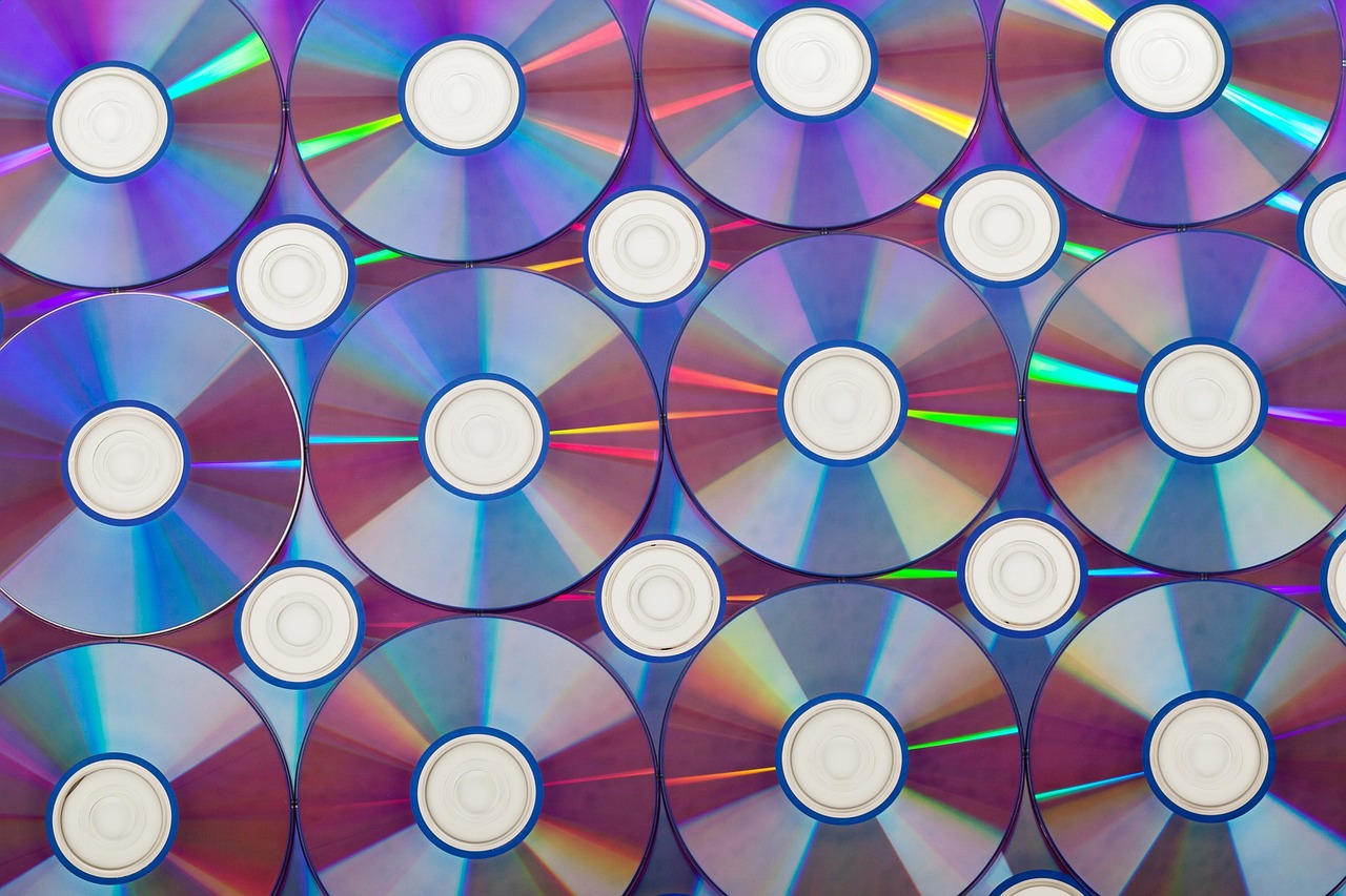 a bunch of cds stacked on top of each other, holography, modern high sharpness photo