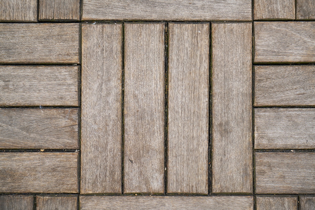 a close up view of a wooden floor, a picture, inspired by Agnes Martin, shutterstock, renaissance, outdoor photo, top - view, broken tiles, wooden platforms