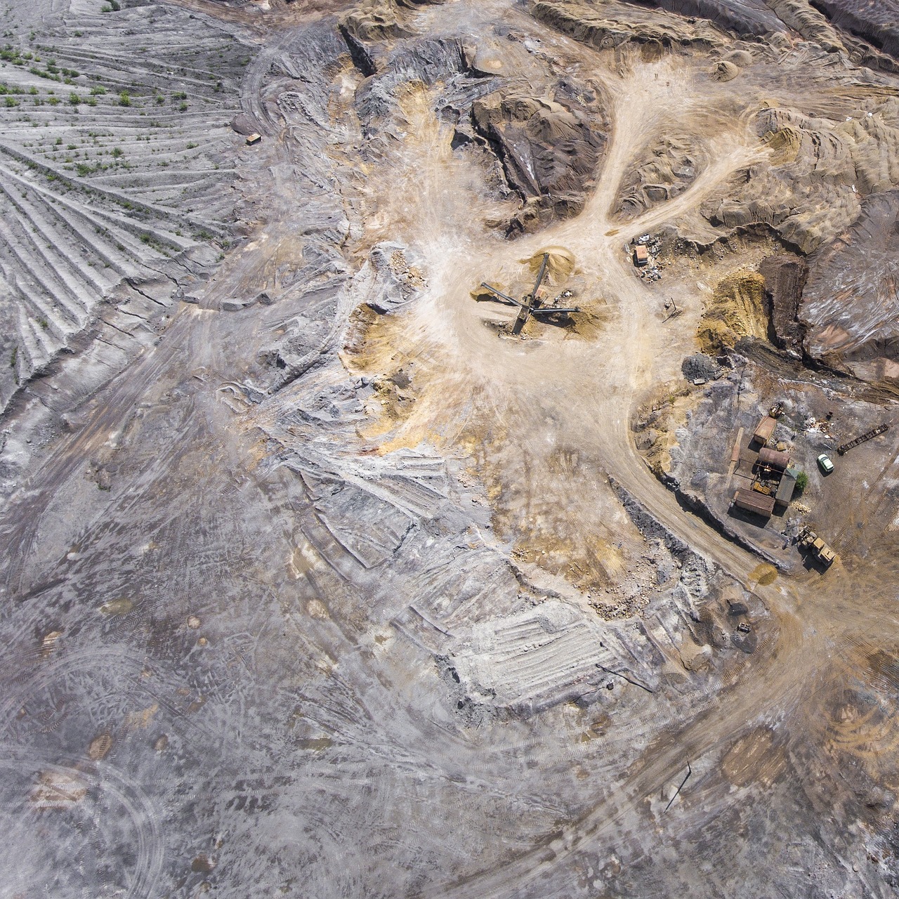 an aerial view of a construction site in the desert, a portrait, figuration libre, rock quarry location, high quality product image”