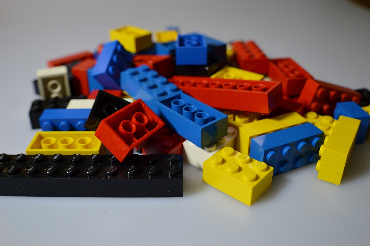 a pile of legos sitting on top of a table, a picture, pexels, modular constructivism, red yellow blue, seen from below, set photo, product introduction photo
