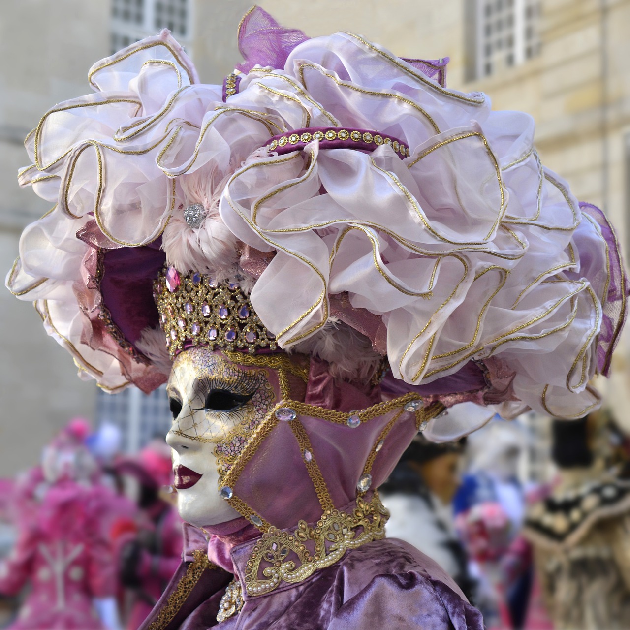 a close up of a person wearing a costume, by Robert Griffier, shutterstock, rococo, purple and pink, prize winning color photo, exquisite helmet detail, dressed in a beautiful