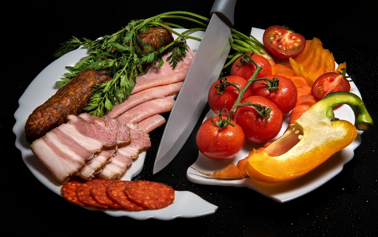 a white plate topped with meat and vegetables, a still life, by Koloman Sokol, shutterstock, knives, also one tomato slice, avatar image, 15081959 21121991 01012000 4k