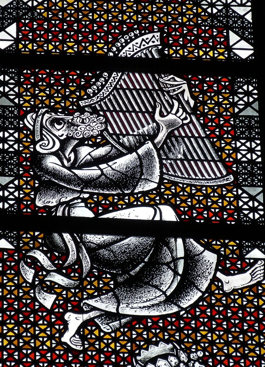 a close up of a stained glass window, inspired by John Rhind, arabesque, the god of music, high detail and high contrast, kneeling, above side view