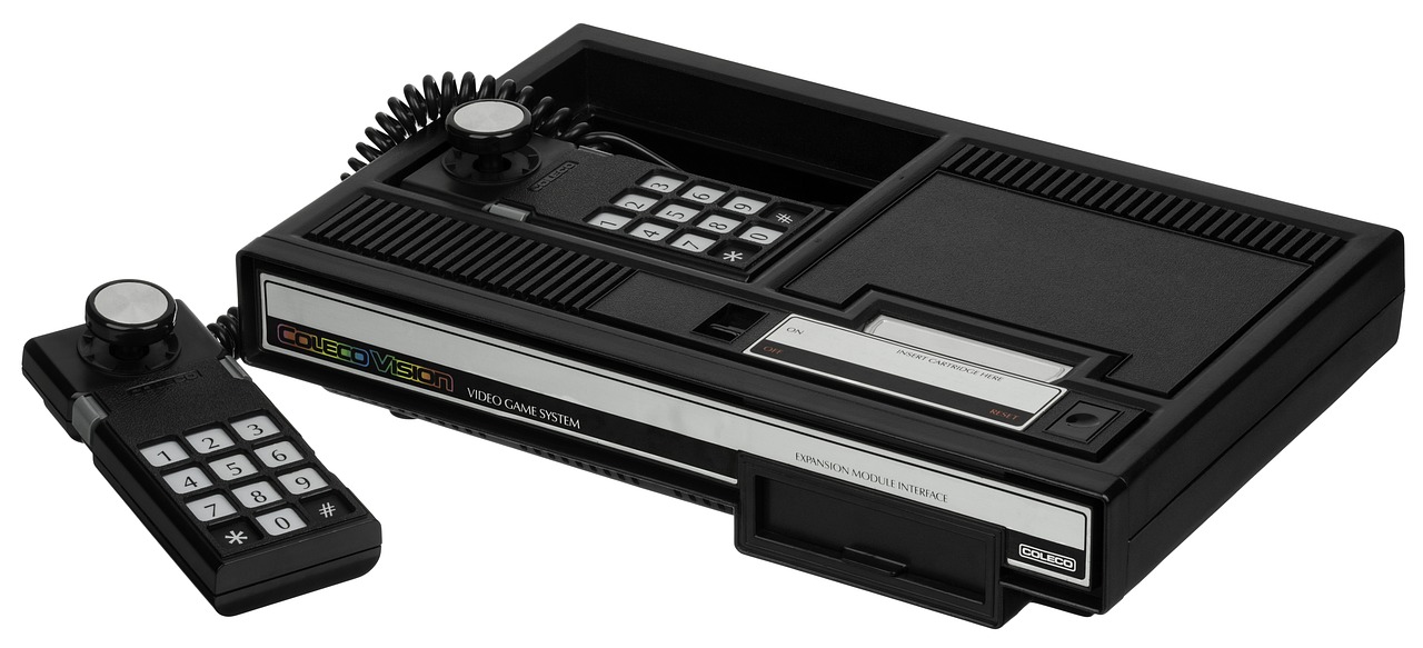a cassette player sitting next to a remote control, concept art, cobra, video game consoles, alpine, black main color, corduroy