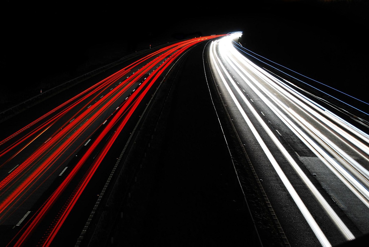 a long exposure photograph of a highway at night, a picture, by Oskar Lüthy, flickr, red and white lighting, phone photo, long tails, brightly lit!