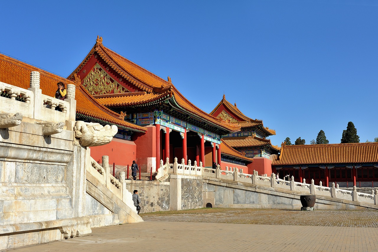 a group of stairs leading up to a building, a picture, by Xuande Emperor, flickr, cloisonnism, giant columns palace, orange roof, tourist photo, sunny morning