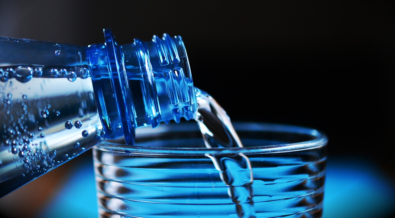 a bottle of water being poured into a glass, a picture, pexels, plasticien, blue transparent jelly, stacked image, stunningly detailed, 3d with depth of field