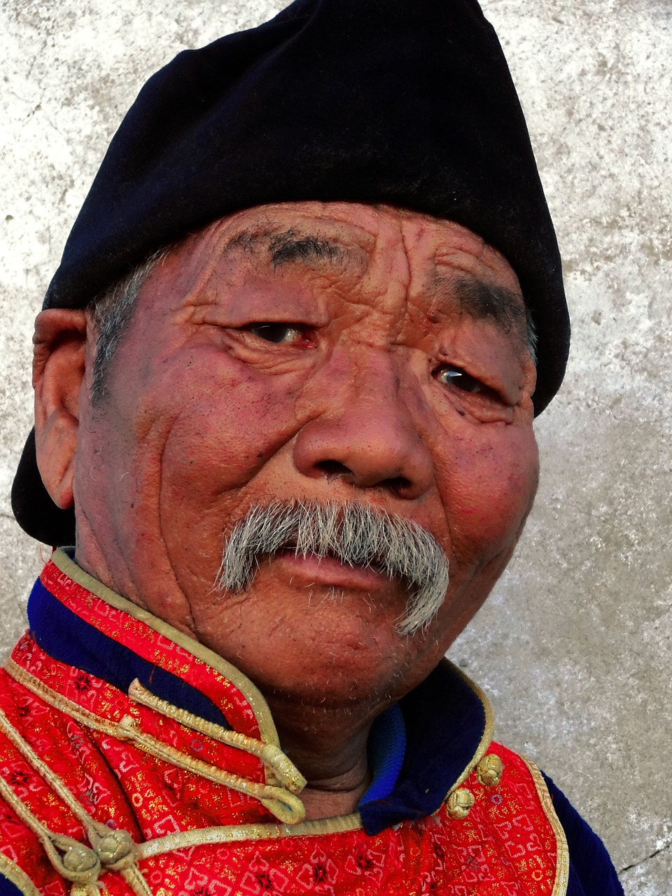 a close up of a person wearing a hat, a portrait, inspired by Nam Gye-u, flickr, cloisonnism, portrait of a rugged warrior, oldman with mustach, portrait”, warm and gentle smile