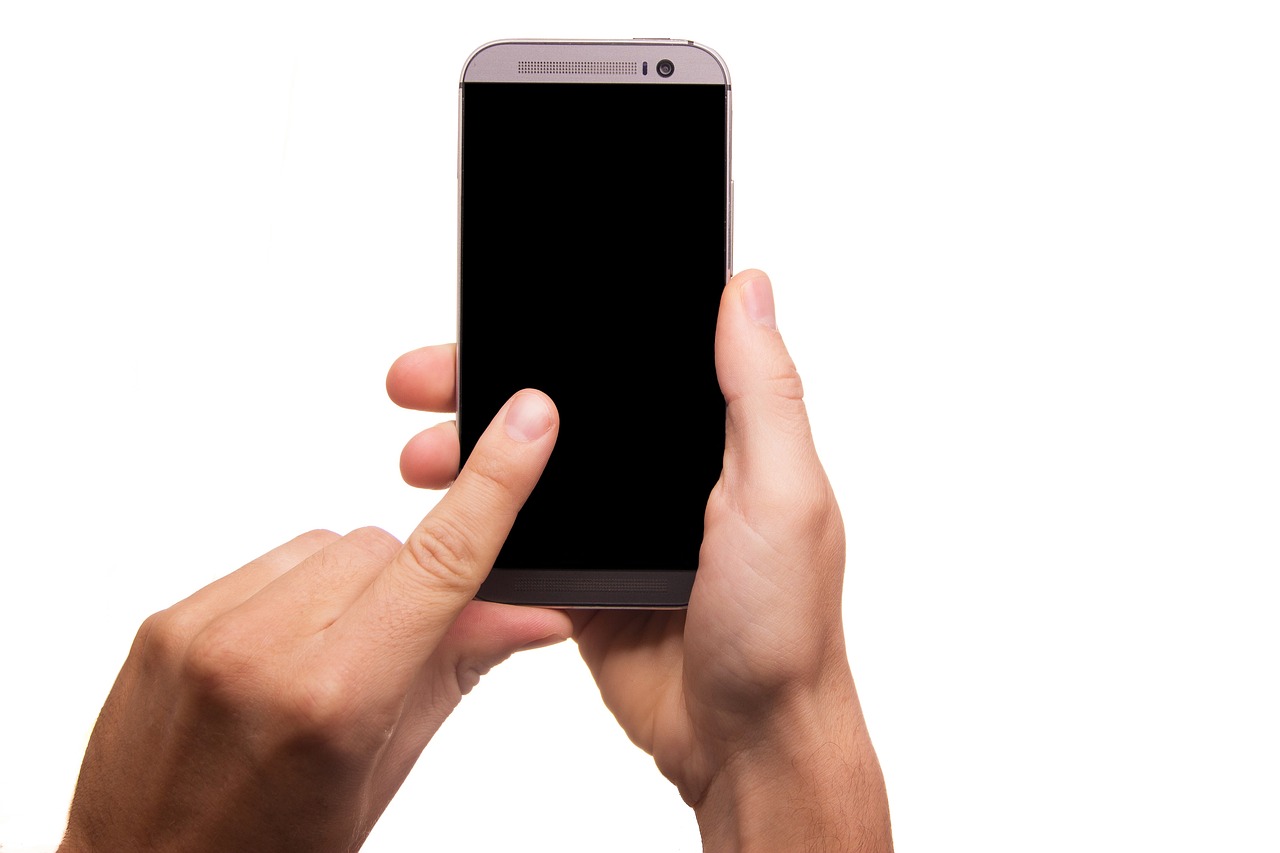 a close up of a person holding a cell phone, a picture, 'white background'!!!, hd photo, leaked image, monitor