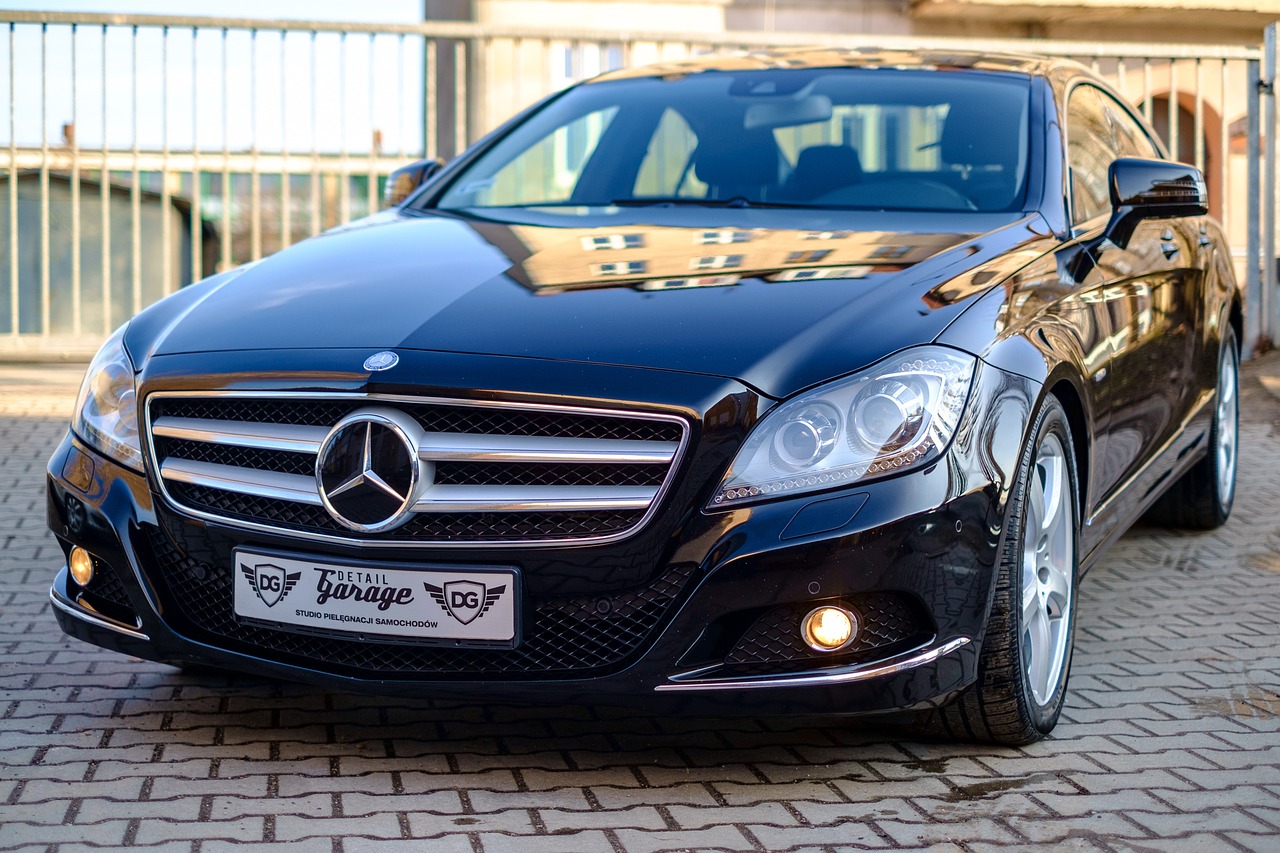 a black mercedes parked in front of a building, a portrait, by Alexander Fedosav, trending on pixabay, baroque, glossy surface, morning detail, modern high sharpness photo, caravagio