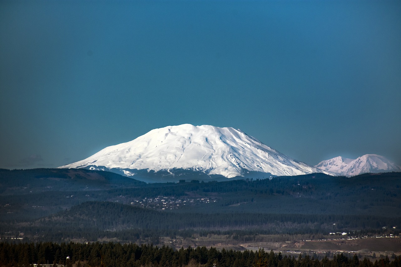 there is a snow covered mountain in the distance, by Andrei Kolkoutine, flickr, oregon, super clear detailed, view from distance, anton semonov