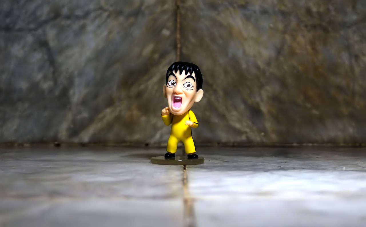 a close up of a toy figure on a floor, a picture, inspired by Ryuzaburo Umehara, despicable, toy photo, baki, toy commercial photo