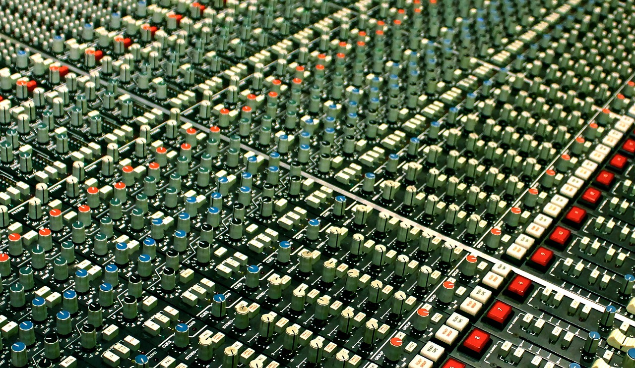 a close up of a mixing board in a recording studio, an album cover, by Sven Erixson, flickr, blue and green and red tones, complex massive detail, in a row, 1 6 x 1 6
