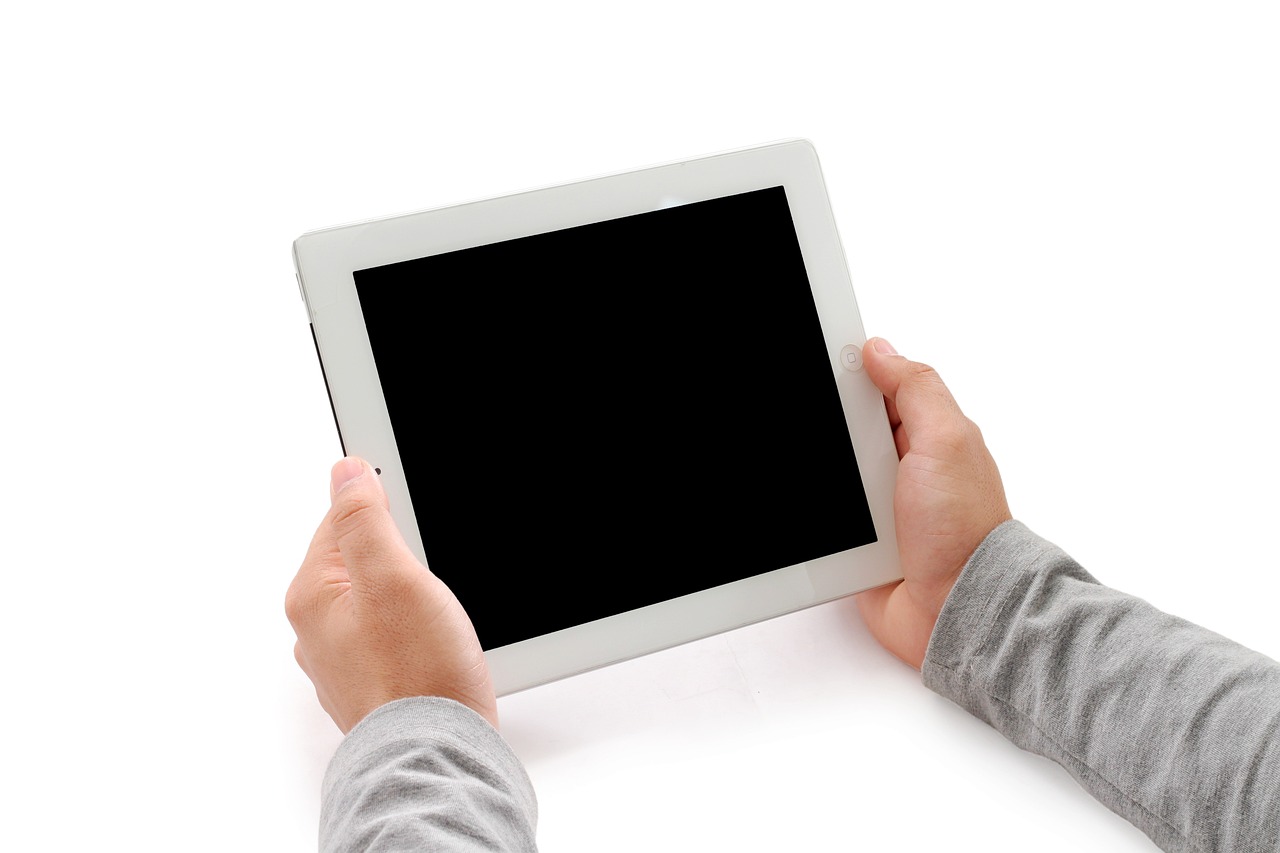 a person holding a tablet with a black screen, a picture, high res photo, white!!, children, product introduction photo