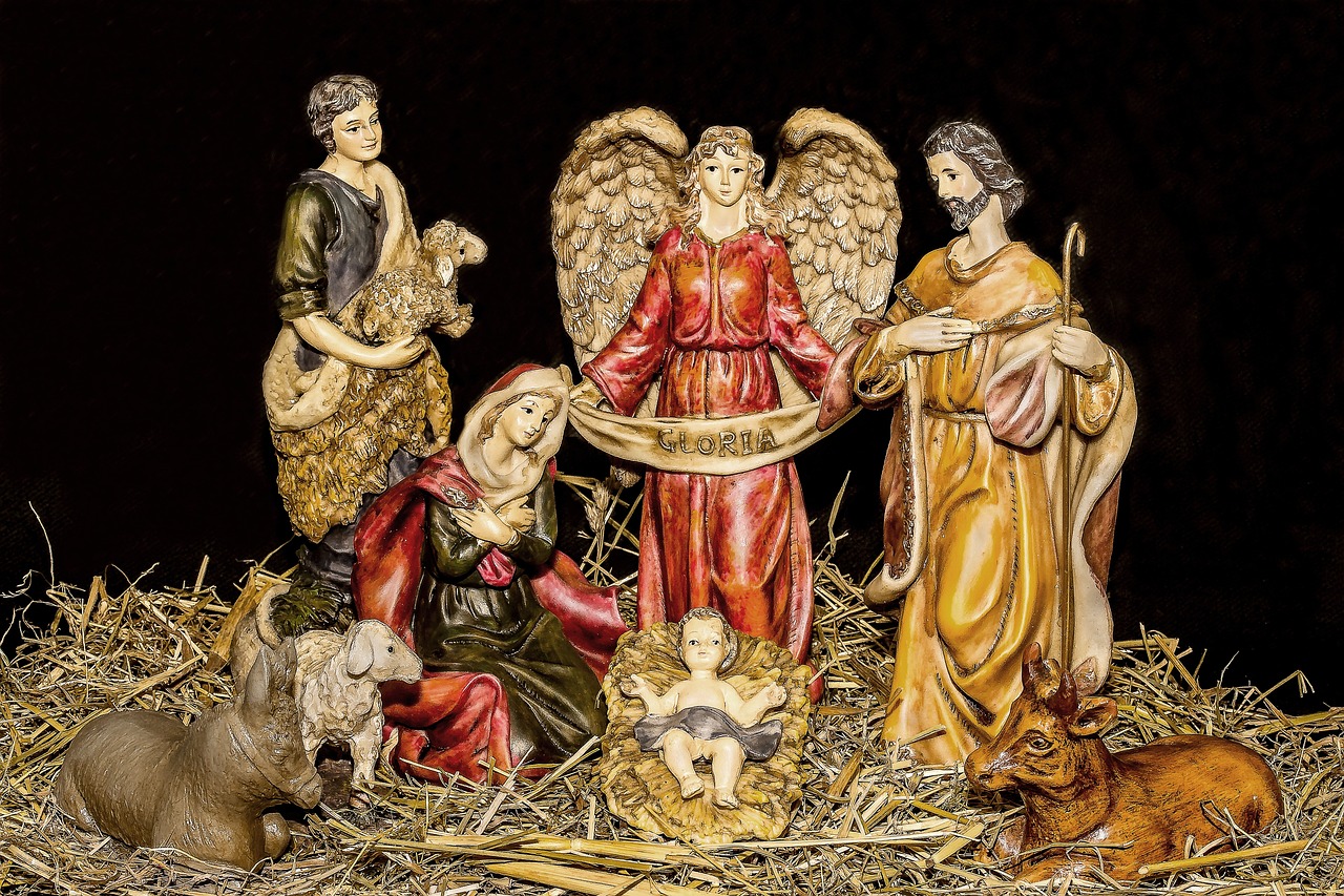 a group of figurines sitting on top of a pile of hay, by Kurt Wenner, shutterstock, figuration libre, with infant jesus, angel relief, set photo, christmas night