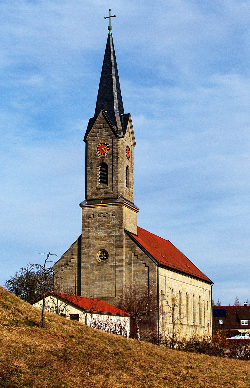 a church with a steeple on top of a hill, a picture, by Thomas Häfner, flickr, romanesque, hungarian, exterior view, rossbach, very symmetrical