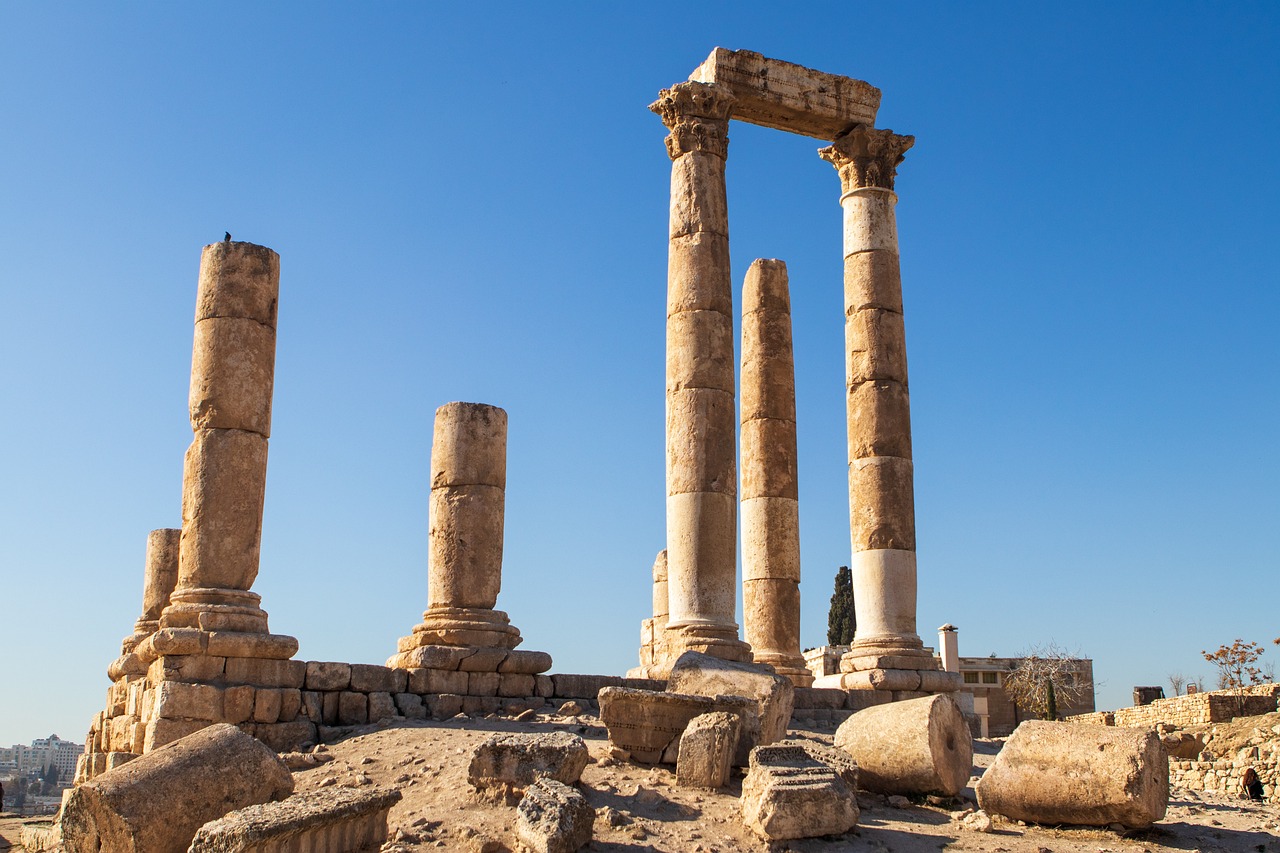 the ruins of the ancient city of palmyra, a marble sculpture, by Edward Corbett, pixabay, neoclassicism, marble columns in background, old town mardin, sunny sky, circular towers