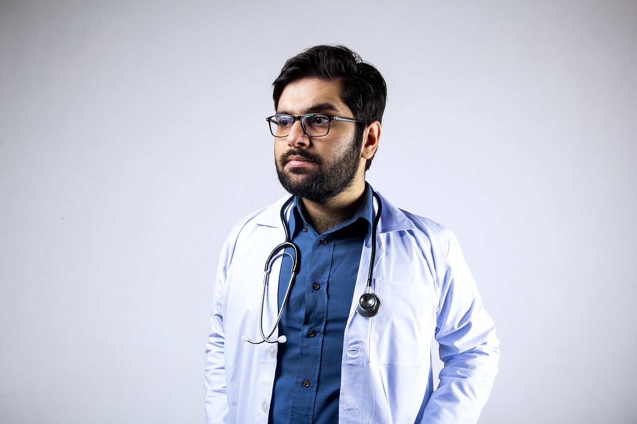 a man in a lab coat with a stethoscope, a stock photo, hyperrealism, a portrait of rahul kohli, full body photo, jewish young man with glasses, close - up studio photo