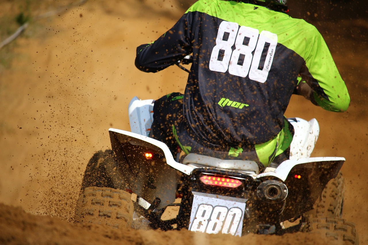 a man riding on the back of a dirt bike, by Romain brook, close-up shot from behind, avatar image, 8 8 8 8, buggy