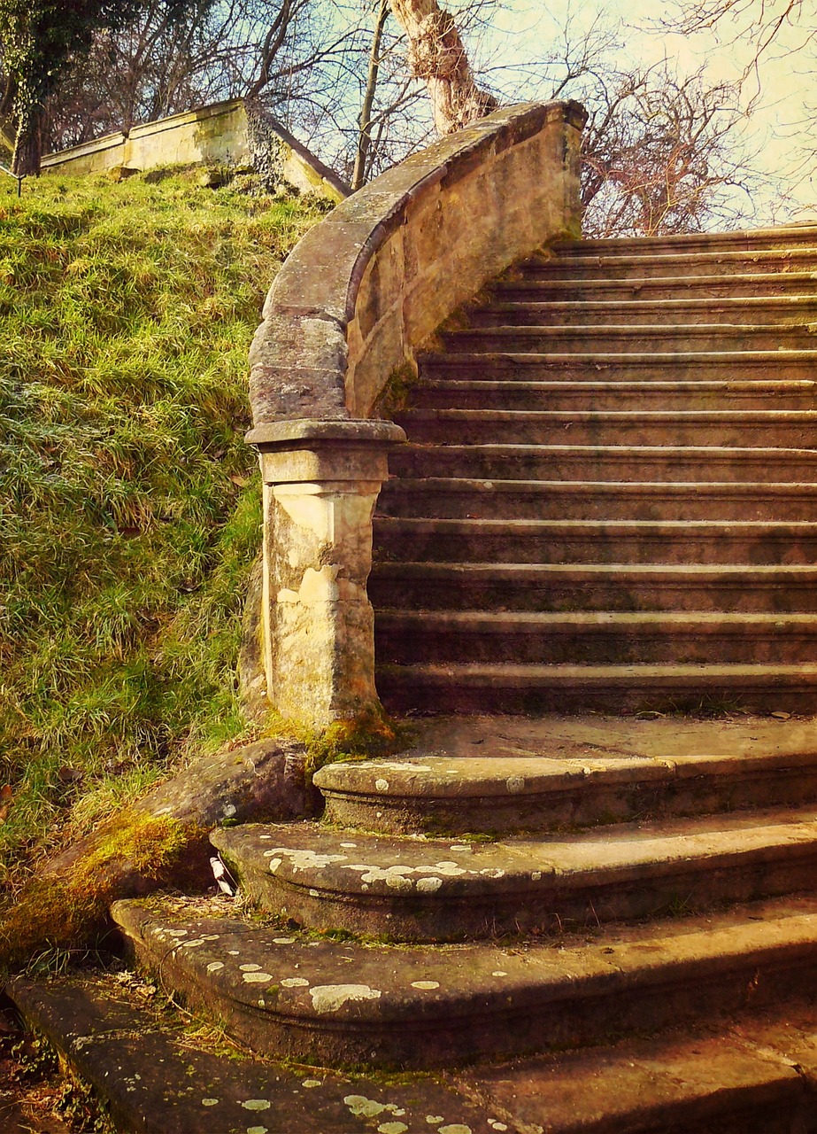 a man riding a skateboard up the side of a stone staircase, a photo, inspired by Tom Chambers, shutterstock, renaissance, highly textured landscape, faded worn, bath, springtime vibrancy